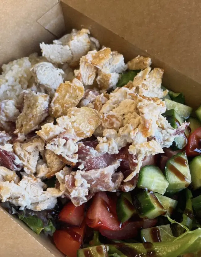 Chicken and rice box with salad